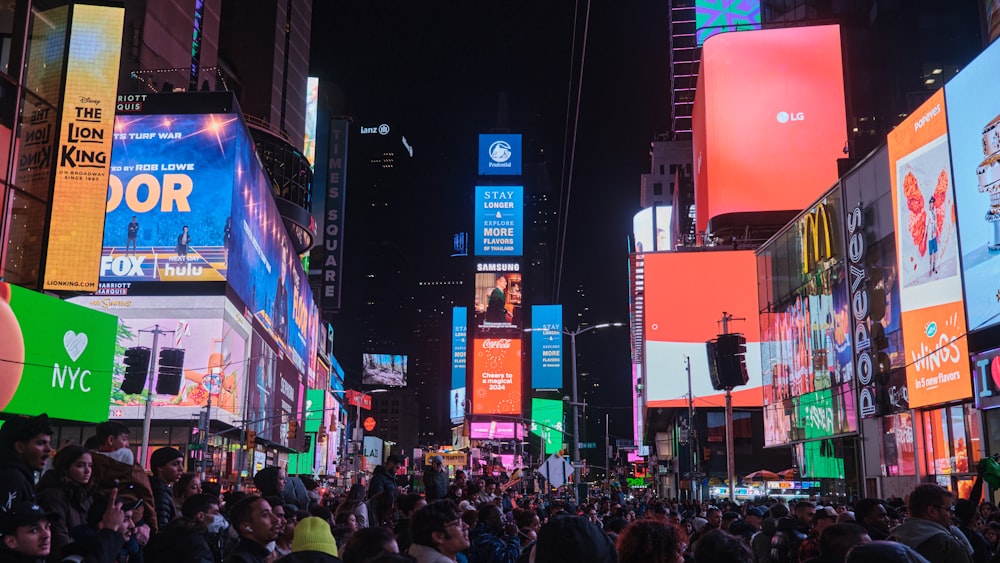 a crowded city street filled with lots of people