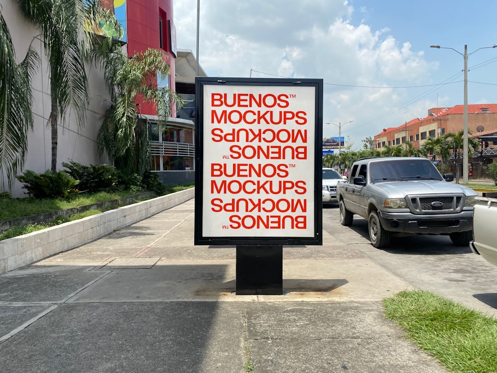 a sign on the side of the road that says bulenos, mockups