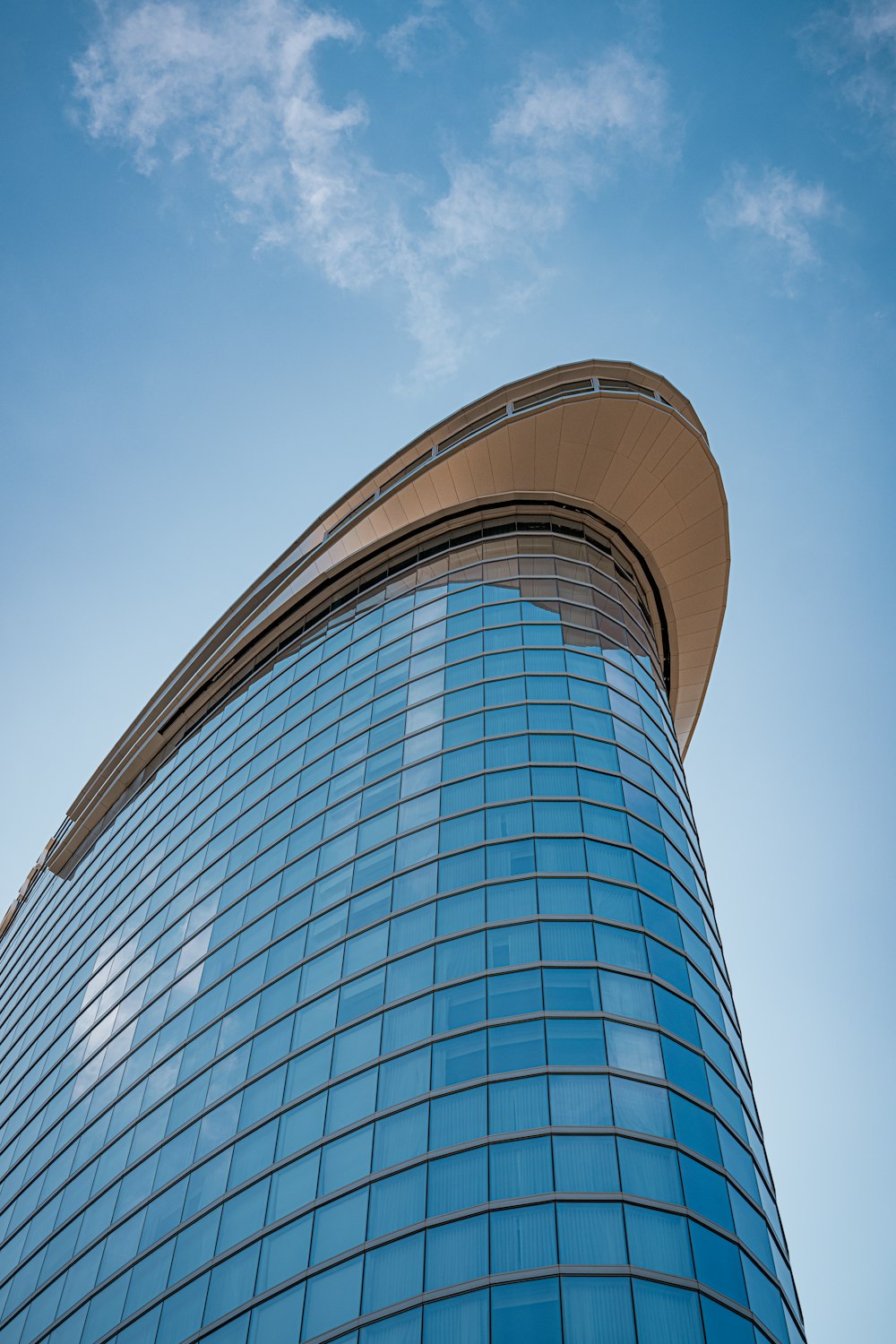 a very tall building with a sky in the background