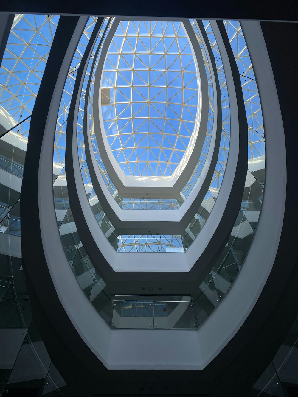 a view of the inside of a building with a skylight