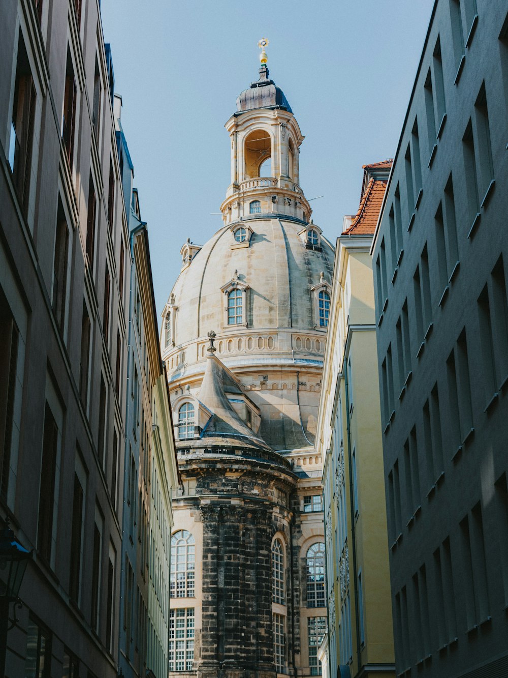 a tall building with a clock on the top of it