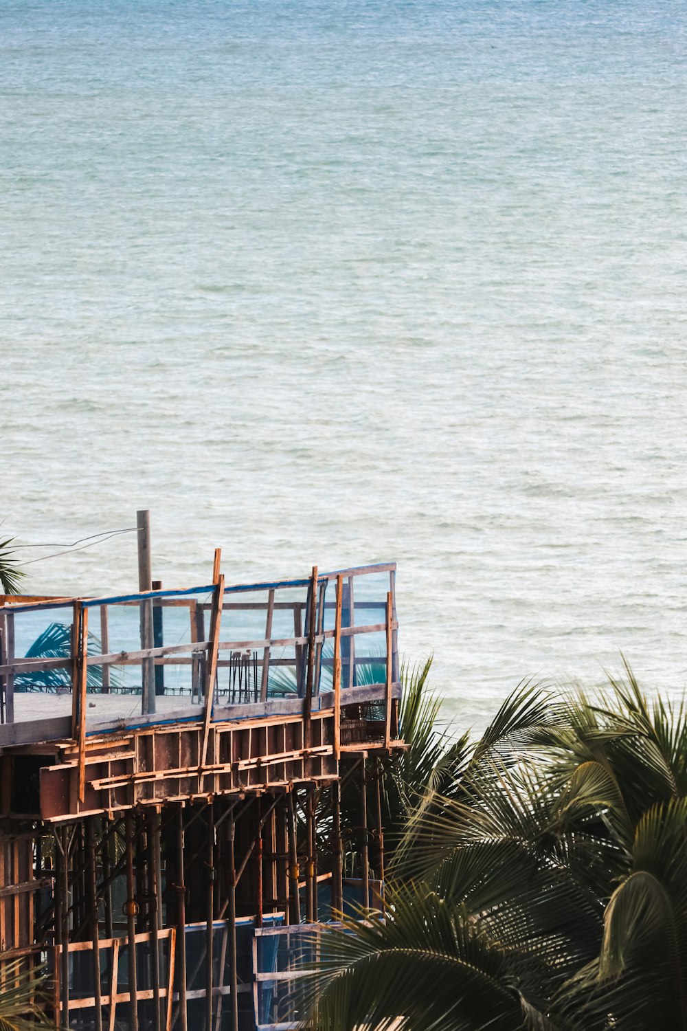 a view of the ocean from the top of a building