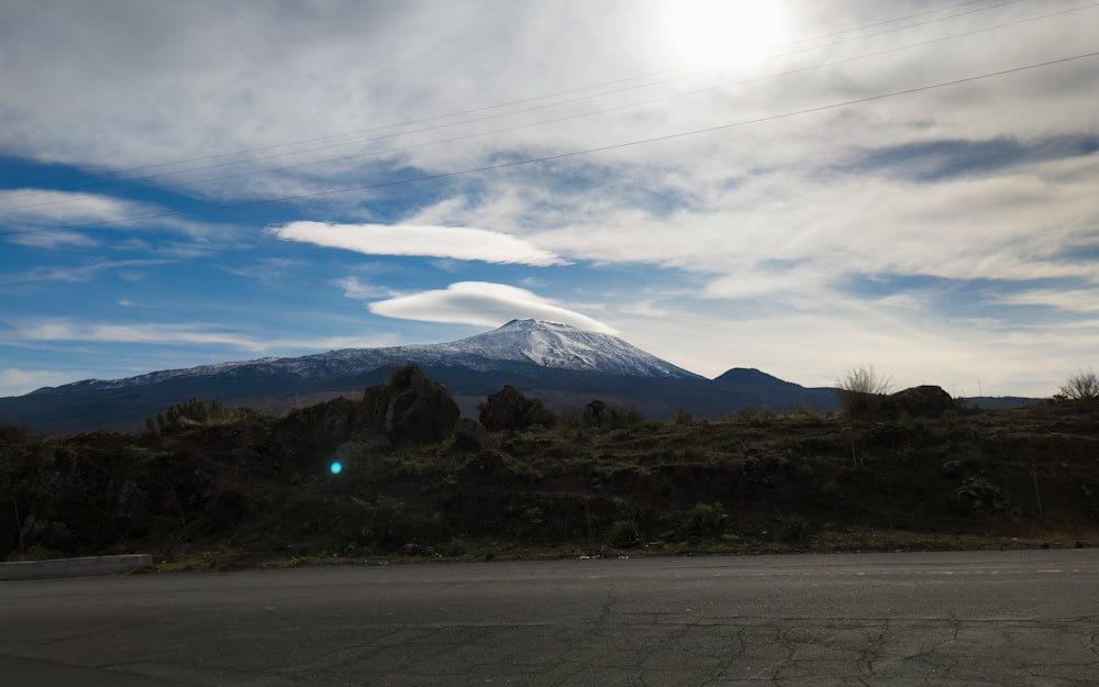 a view of a snow covered mountain in the distance