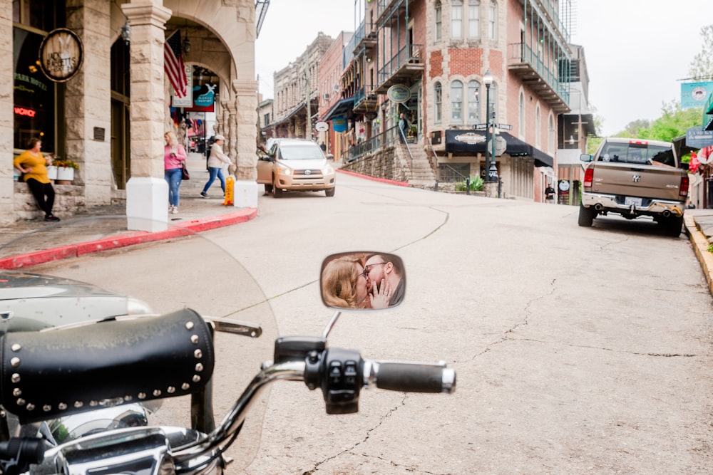 a motorcycle parked on the side of a street