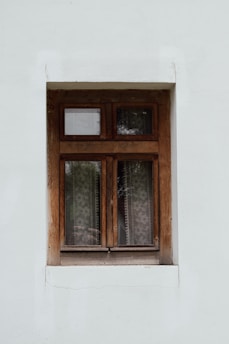 a window that has a curtain on it