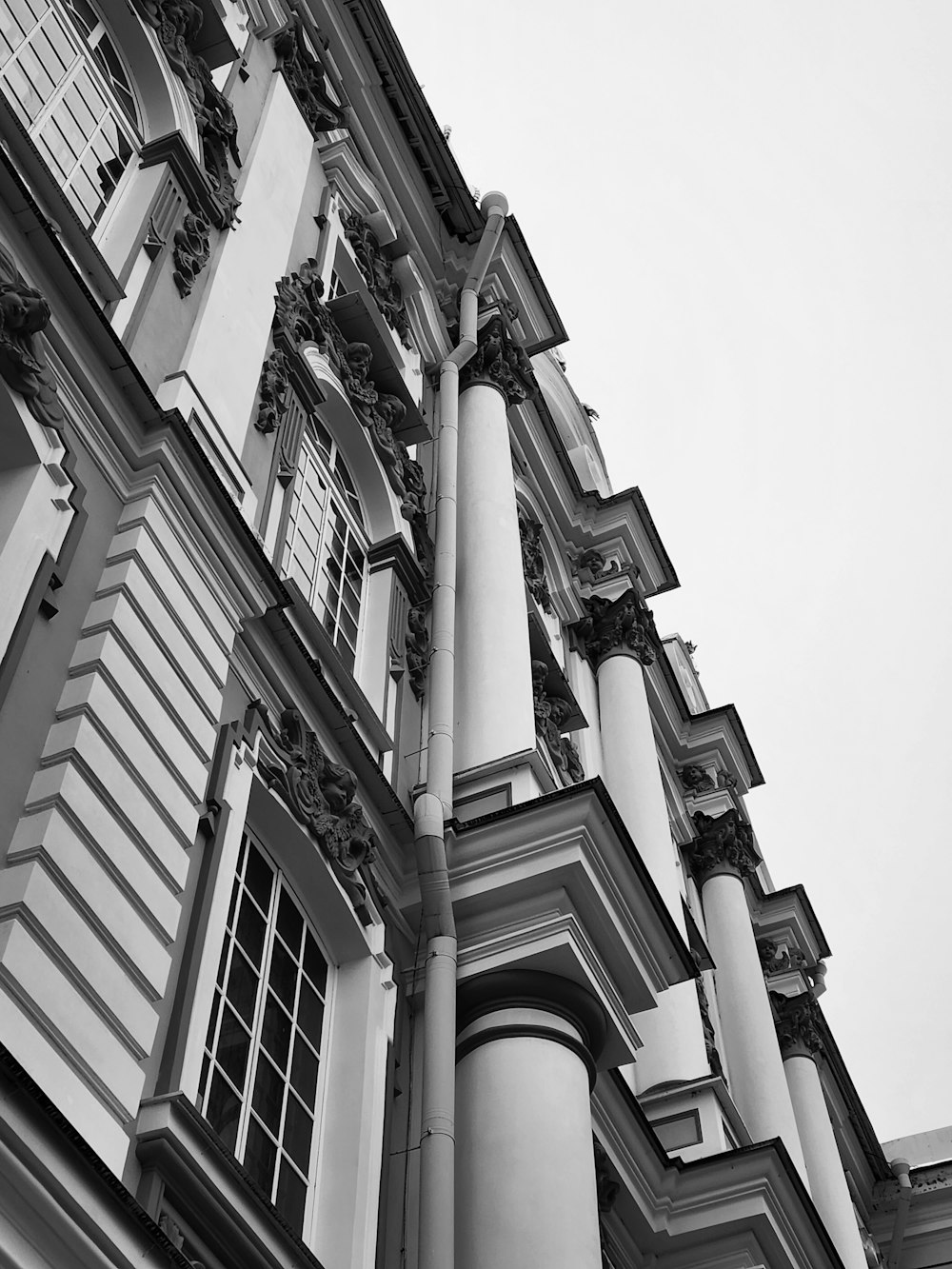 a black and white photo of a tall building