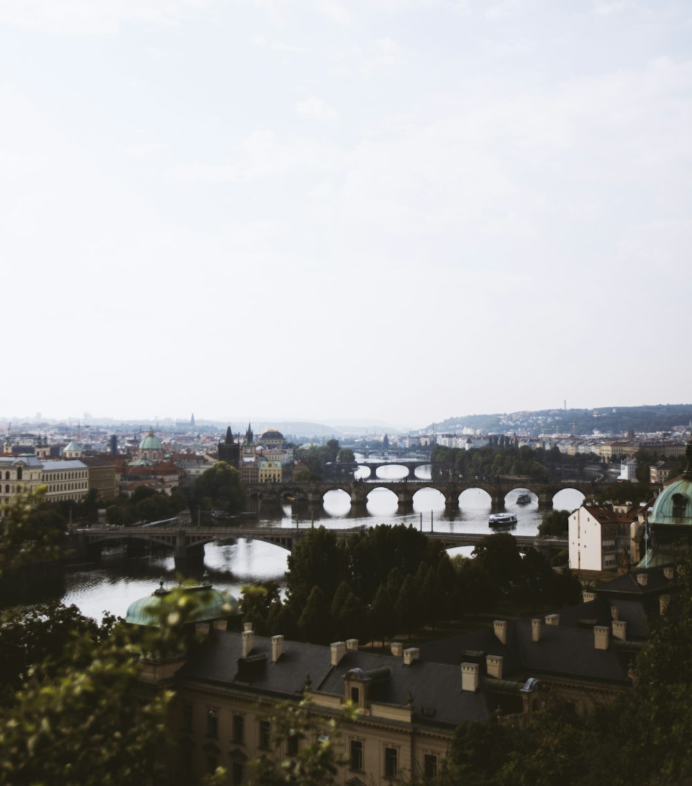 a view of a city with a bridge over a river