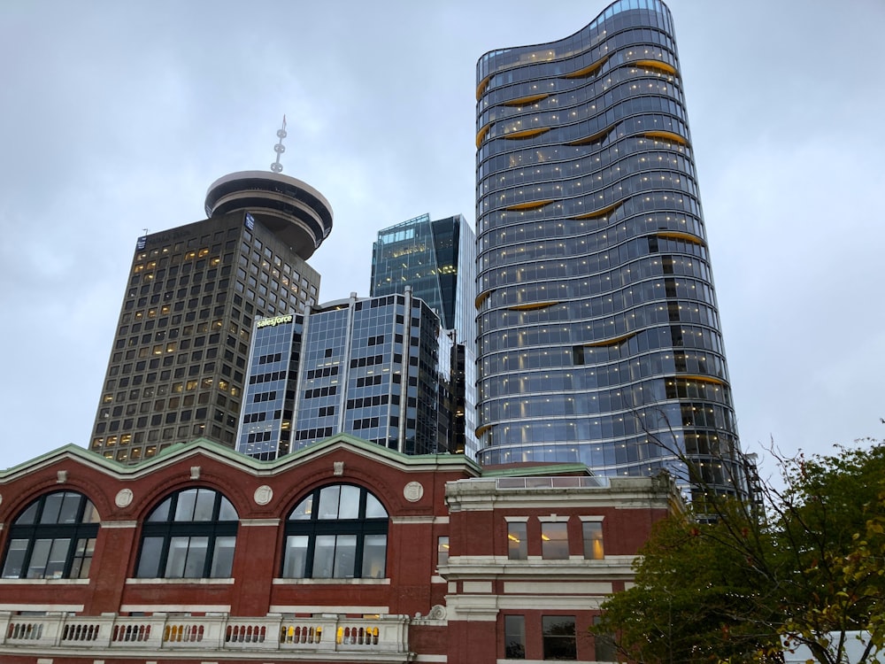 a group of tall buildings sitting next to each other