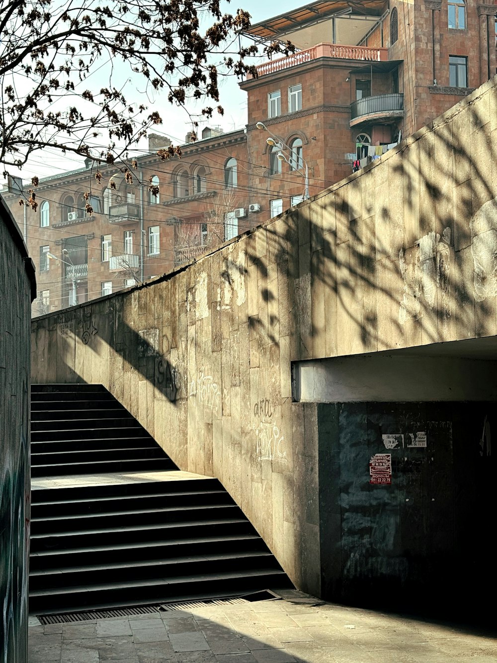 a concrete wall with stairs leading up to it