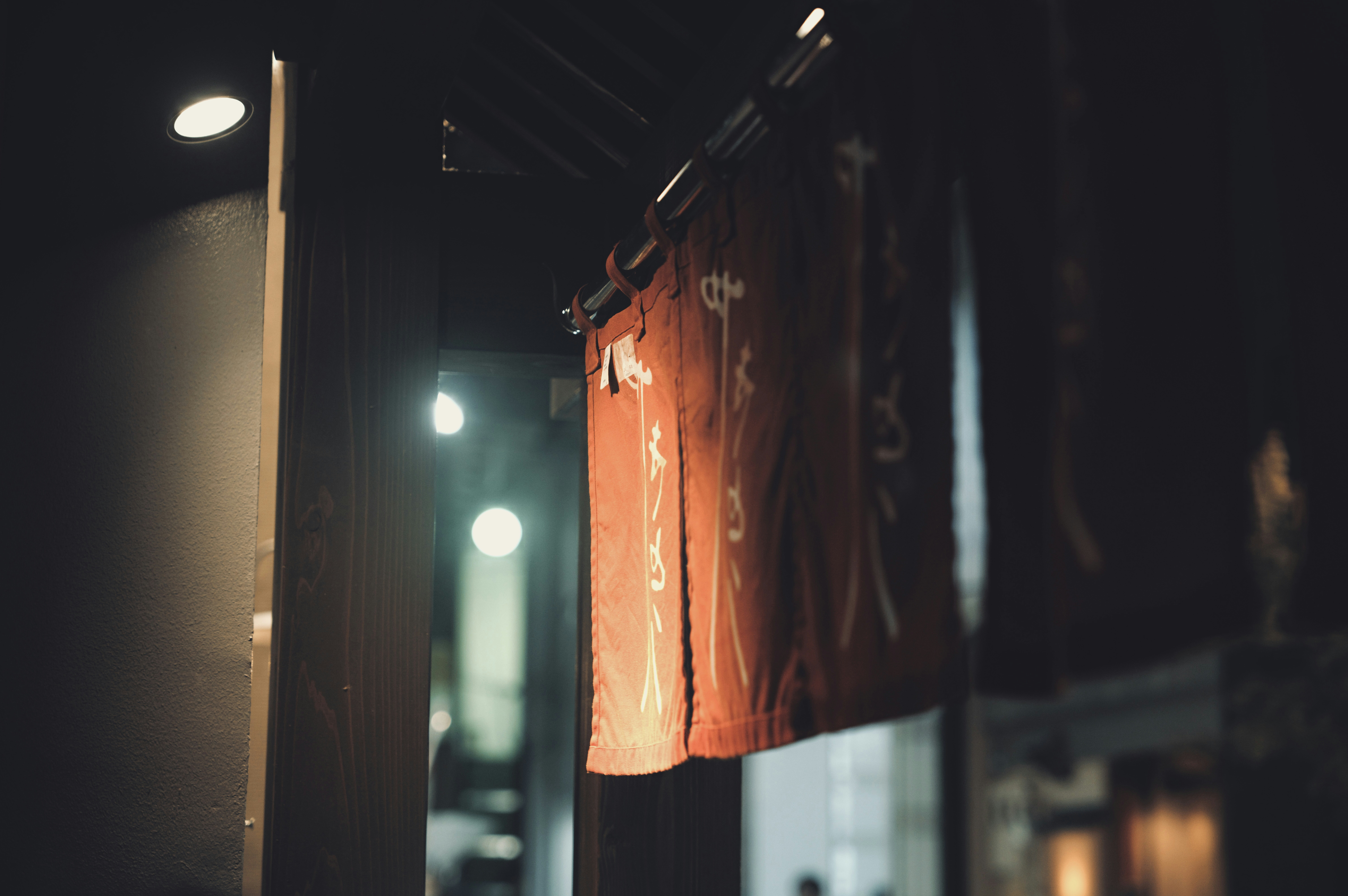 woman wearing yellow long-sleeved dress under white clouds and blue sky during daytime