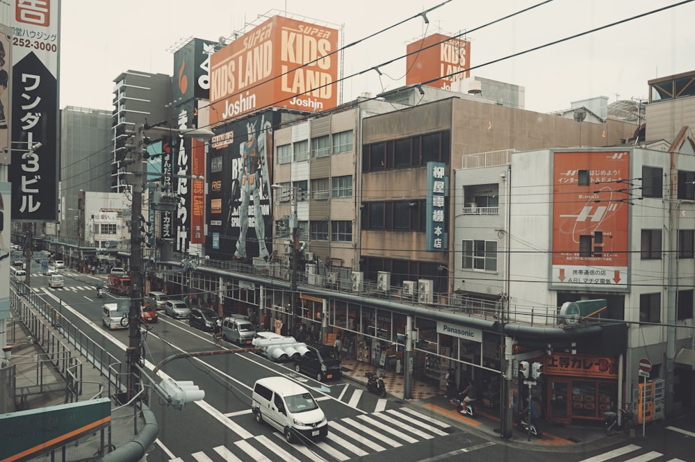 a city street filled with lots of tall buildings