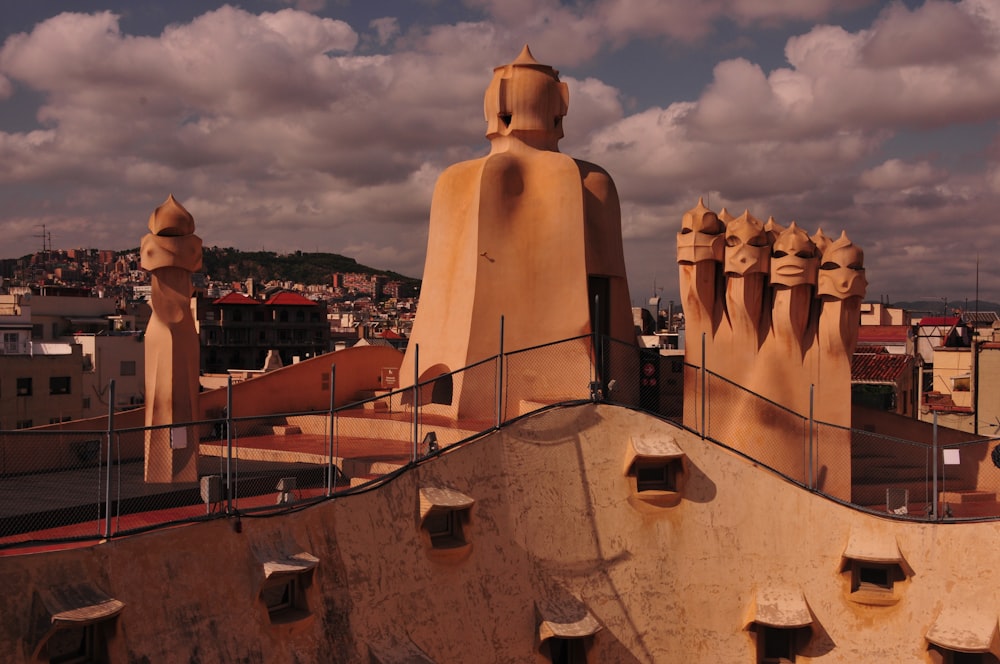 a view of the roof of a building in a city