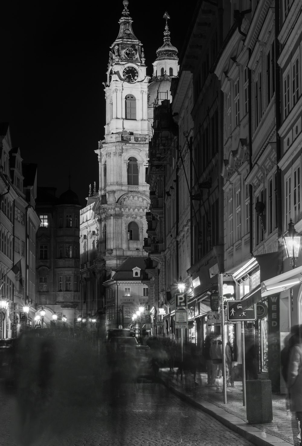 a black and white photo of a clock tower