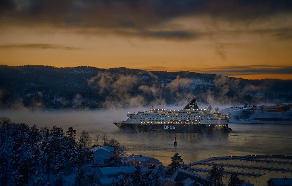 a large cruise ship in the middle of a body of water