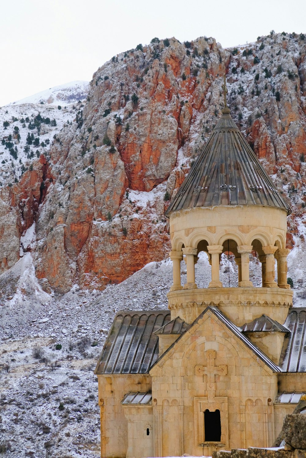a church in the middle of a snowy mountain