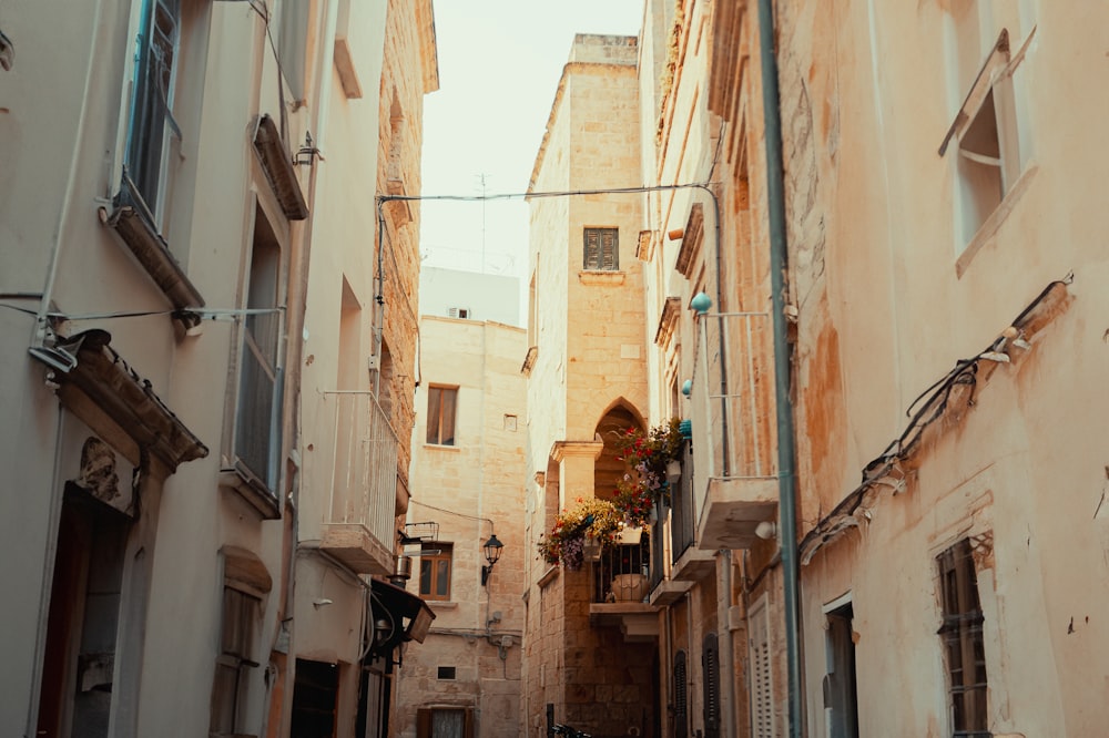 a narrow alleyway in a european city