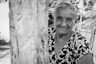a black and white photo of an older woman