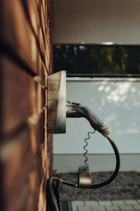 plugged in ev charger on wall
