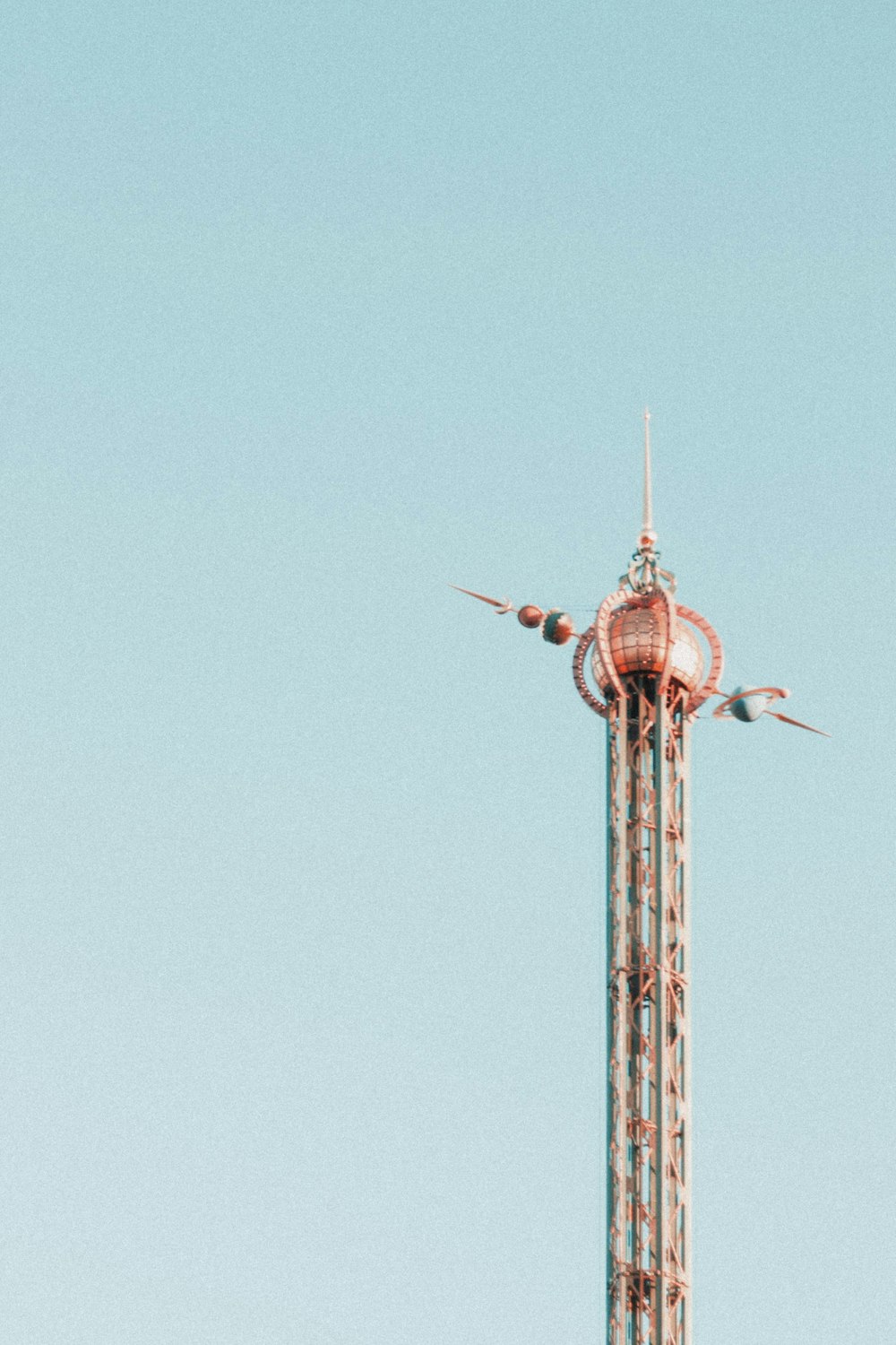 a tall clock tower with a sky background