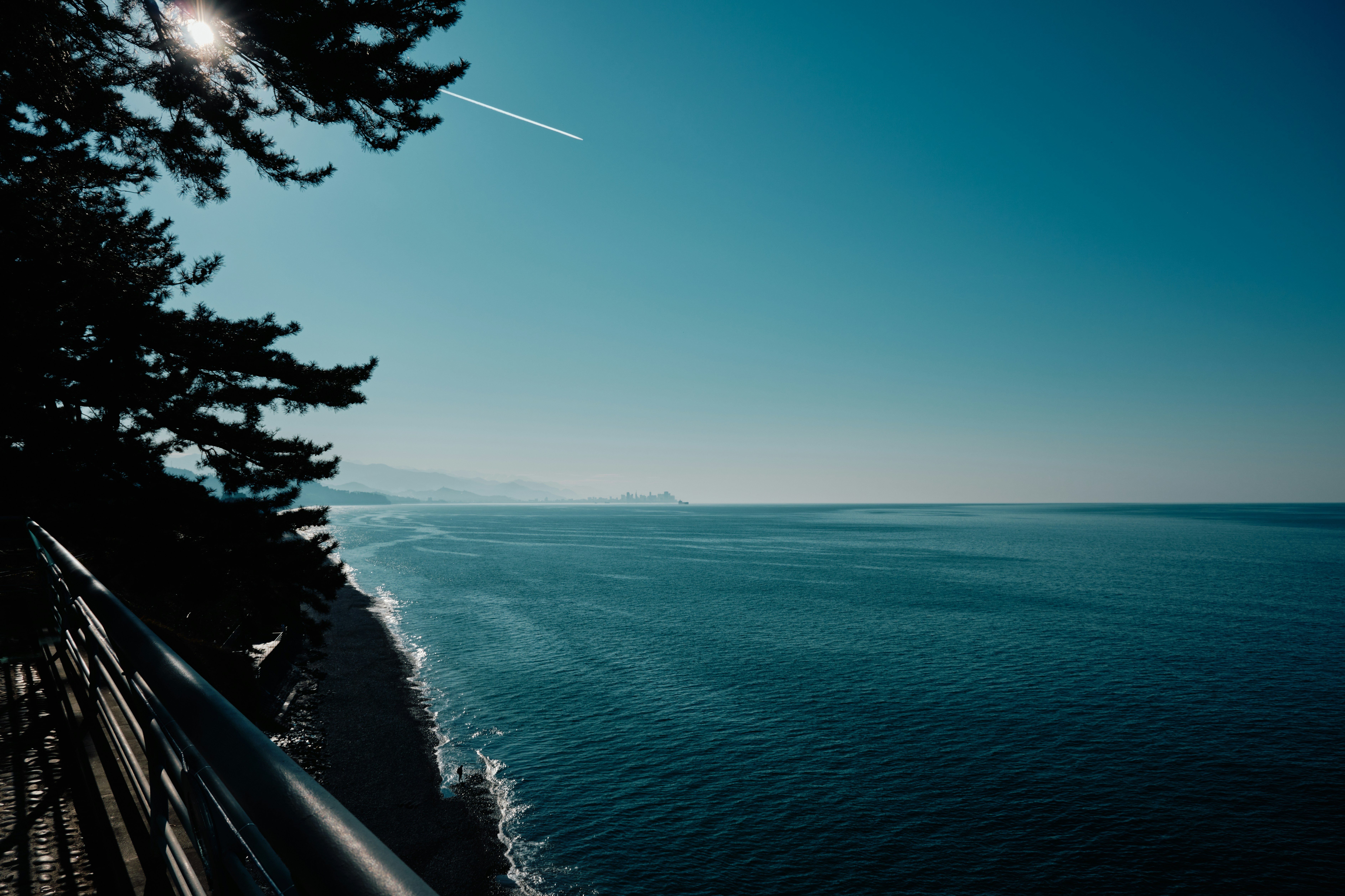 a view of a body of water from a bridge