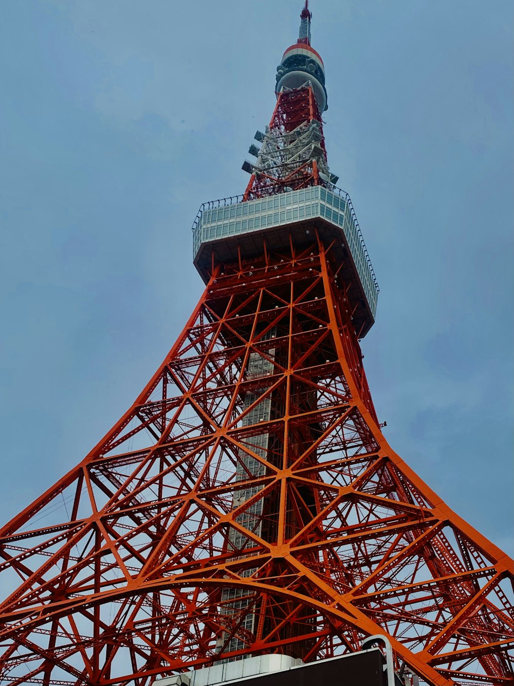 a very tall tower with a clock on it's side