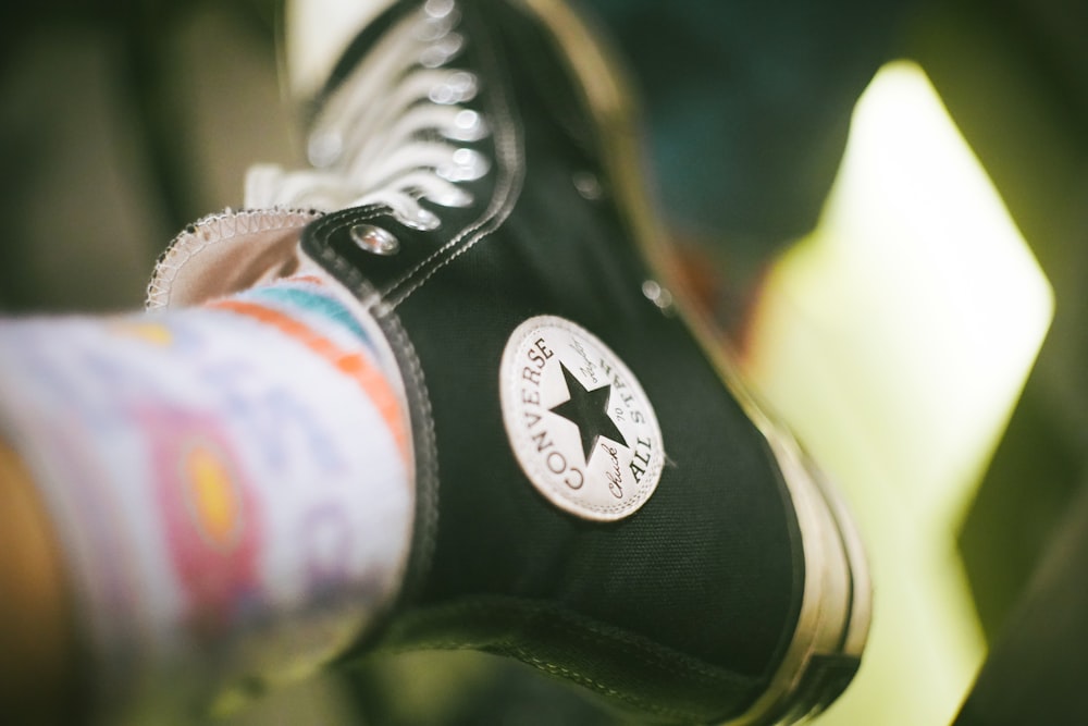 a close up of a person's shoe with a star on it