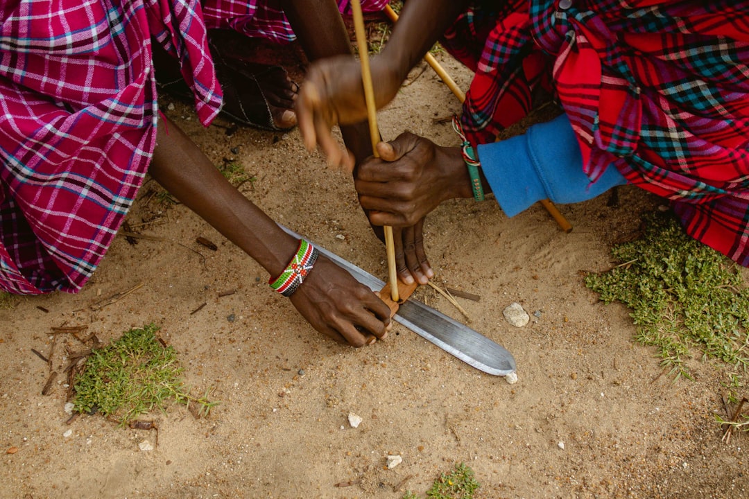 A glimpse of how the Masai light their fire. Using friction to their advantage.