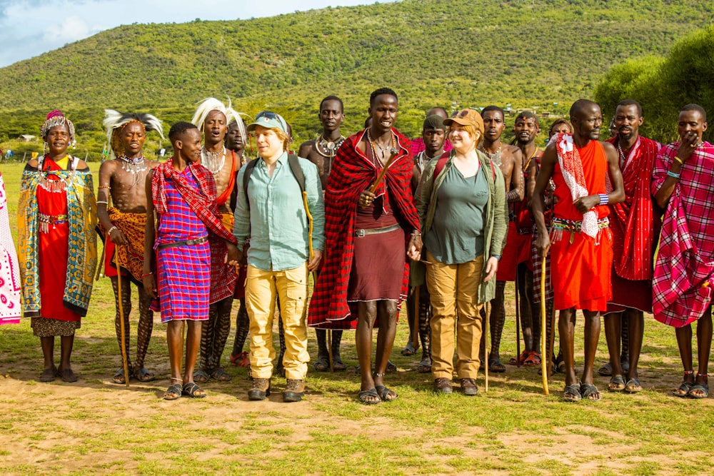 a group of people standing next to each other