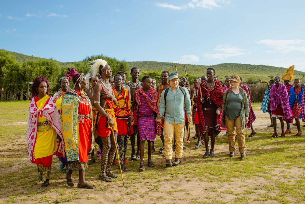 a group of people standing next to each other