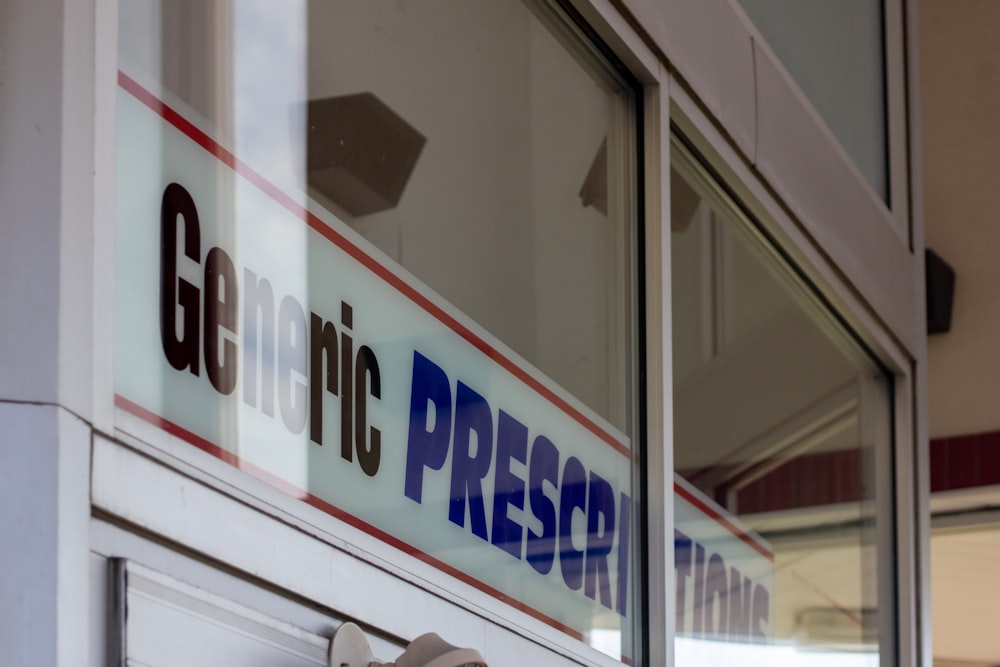 a close up of a window with a sign on it