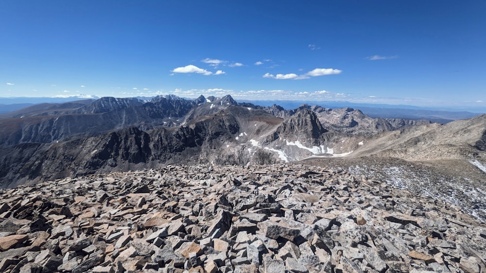 a view of the mountains from the top of a mountain