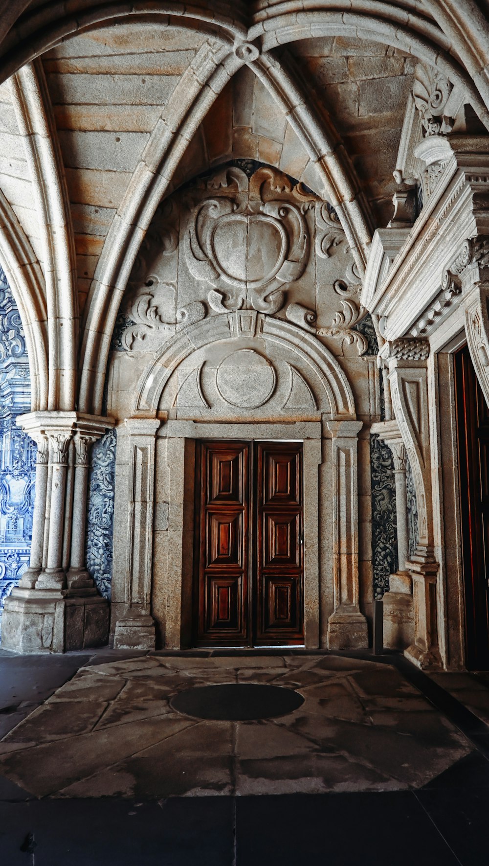 a doorway in a stone building with a wooden door