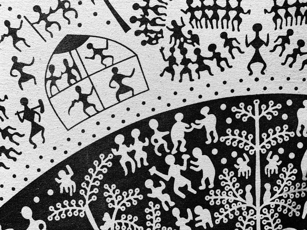 a black and white drawing of people and trees
