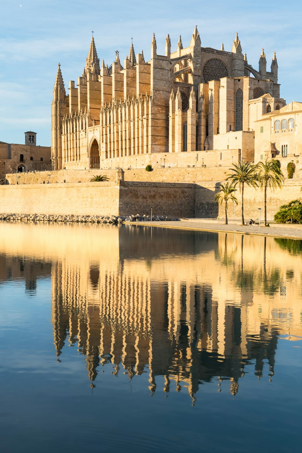 a large building sitting next to a body of water