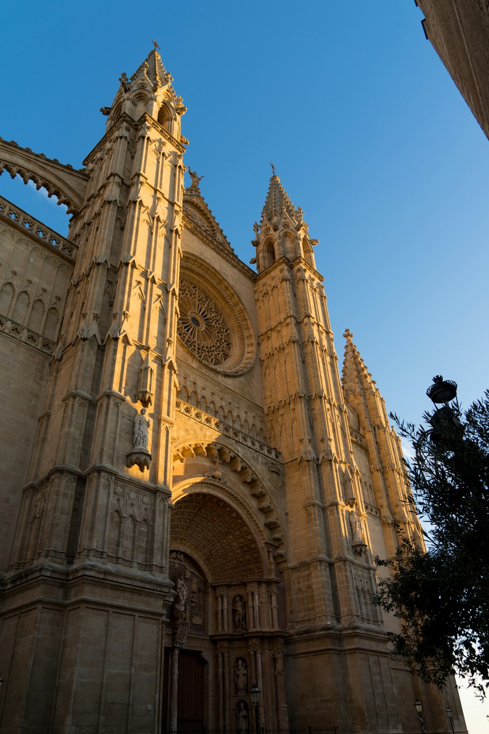 a large cathedral with a clock on the front of it