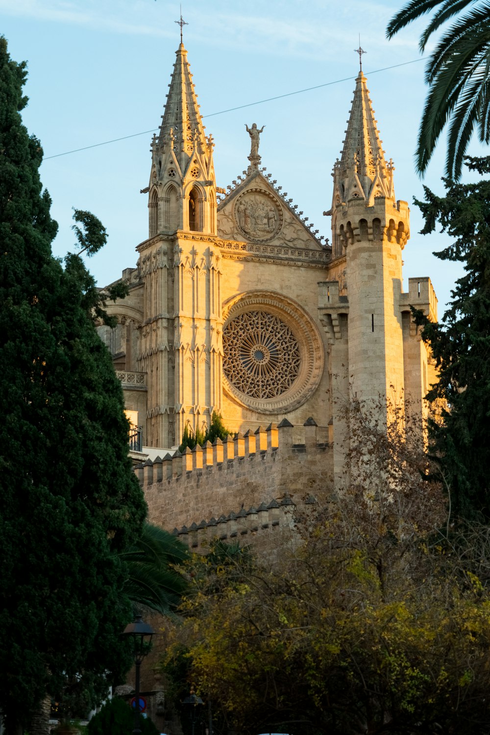 a large cathedral with a clock on the front of it