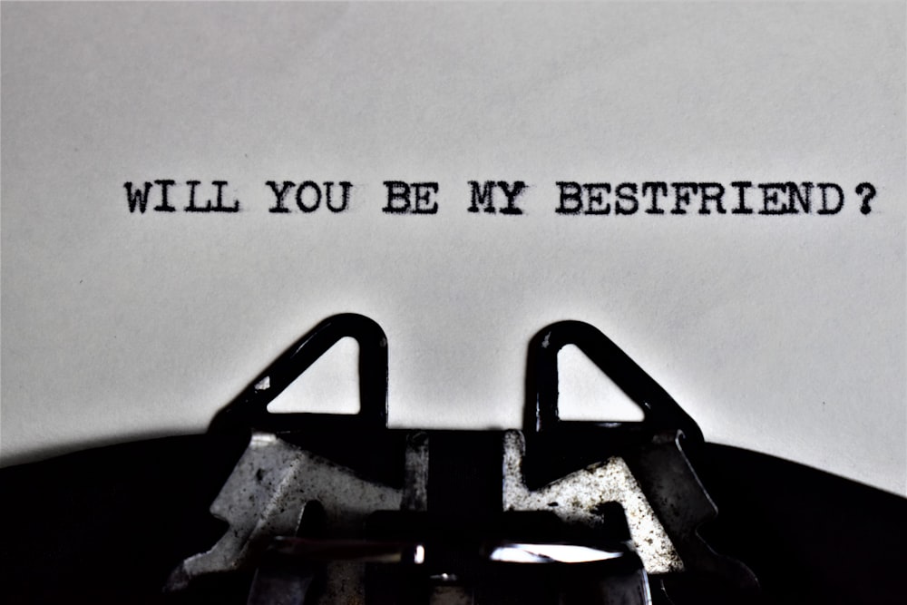 a typewriter with the words will you be my best friend?