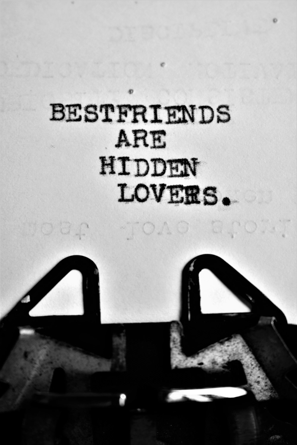 a typewriter with the words best friends are hidden lovers