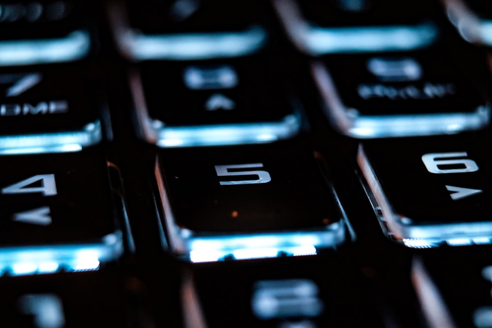 a close up of a keyboard with numbers on it