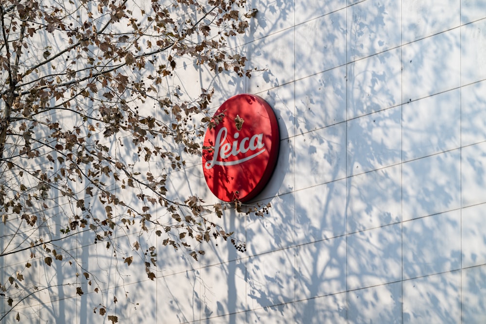 a red sign on the side of a building