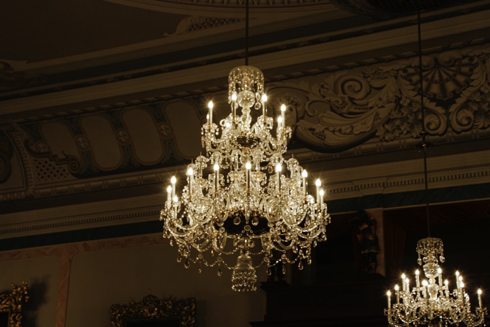 a chandelier hanging from a ceiling in a room