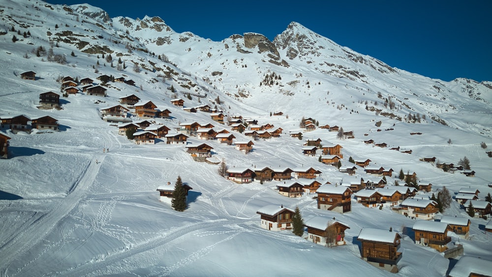 a ski resort with a mountain in the background