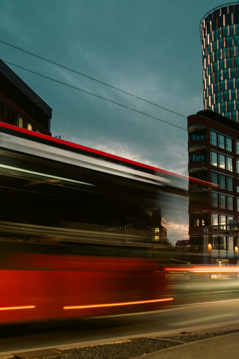 a blurry photo of a building and a bus