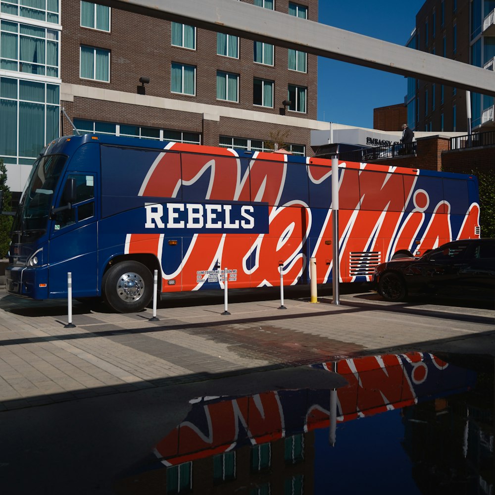 a pepsi truck parked in front of a building