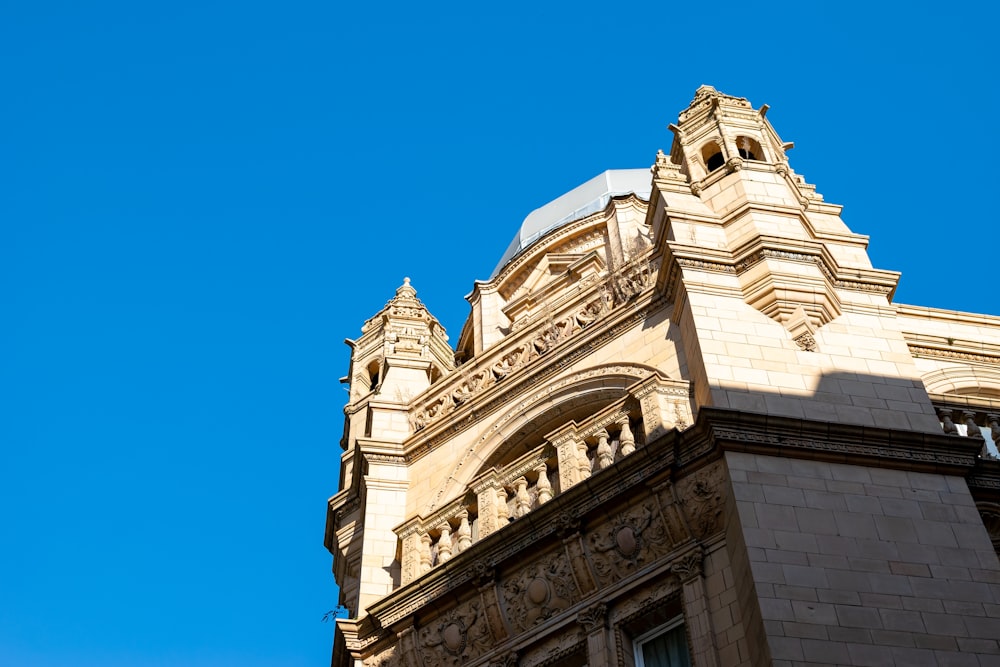 a tall building with a clock on the top of it