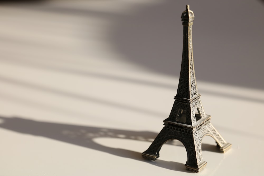 a miniature model of the eiffel tower on a table