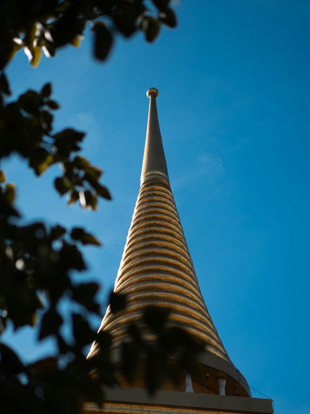 the top of a building with a clock on it