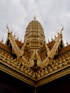 the roof of a building with a dragon decoration on it