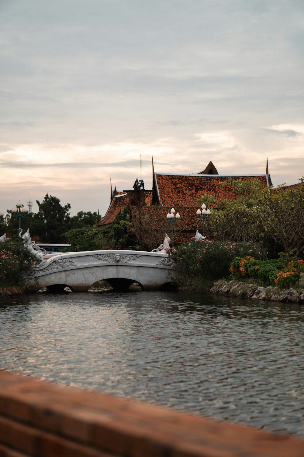 a white boat sitting on top of a river