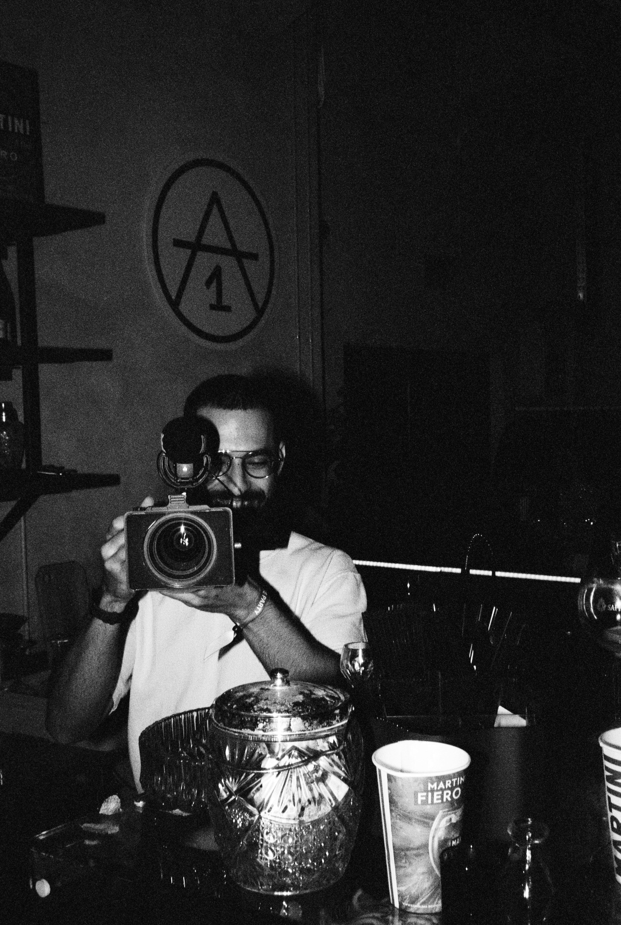 a man taking a picture of himself with a camera